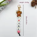 Ansprechender Silikonperlen-Schlüsselanhänger mit Cartoon-Kuh und L-LOVE-YOU - Hochlandkuh-Stil (K-1775)