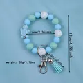 Blue silicone beaded wristlet keychain featuring a turtle charm and tassel decoration - Sky Blue