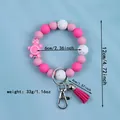 Handmade pink silicone bead wristlet keychain featuring cute turtle charm and matching tassel - Rose Red