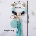 Turquoise siliconen kralen sleutelhanger met kwastje en MAMA-bedeltje - Smaragd