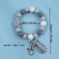 Creative grey silicone beaded keychain bracelet with turtle charm and tassel decor - Space Gray
