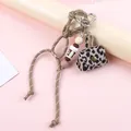 Chic leopard print mini bag keychain with braided rope and beaded coffee cup charm - Leopard Mini Purse Keychain (Dark Khaki) / Dark Khaki