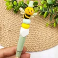 Cute bee themed DIY silicone beaded ballpoint pen with pastel green barrel and charms - Bee Beaded Pen (K-1388)