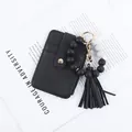 Black leather card holder with black and white beaded bracelet and tassel keychain set - Black