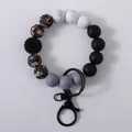 Silicone beaded bracelet keychain with floral print and black daisy charm variant - Black