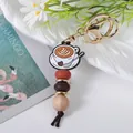 Wooden bead keychain with coffee cup silicone charm and terracotta bead accents - Garland