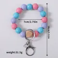 Handmade colorful wooden bead wristlet keychain with pink blue and purple beads - Pink