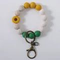Handmade silicone bead bracelet keychain with yellow sunflower and leopard print beads - Wheat