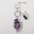 Spooky Book Club silicone keychain with purple witch hat, skull charm and black tassel - Black