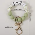 Sage green silicone bead wristlet keychain with MAMA letter beads and leopard prints - Matcha Green