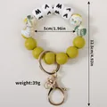 MAMA silicone bead keychain wristlet bracelet with floral patterns and gold ring - Olive