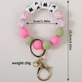 Porte-clés bracelet en perles de silicone léopard avec lettres MAMA et fermoir mousqueton - Rose