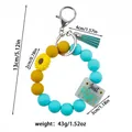 Yellow and blue silicone bead wristlet keychain with sunflower charm and tassel - Bead Chain Style / Mint Green Ring