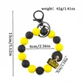 Yellow and black silicone bead keychain bracelet with God is My Strength charm and dimensions. - Key Ring Style / 1 Piece