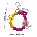 Silicone bead keychain bracelet in purple and yellow with sunflower and tassel charm - Bead Chain Style / Purple Ring