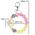 Cute silicone beaded keychain wristlet with cartoon notebook charm and pink beads - Wristband Style / Yellow