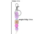 Handmade silicone bead keychain featuring rose design and natural wooden bead, 5.1 inch - Purple