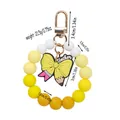 Yellow gradient silicone beaded keychain featuring a pencil bow charm with teacher text - Yellow