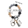 Silicone bead keychain bracelet with mini coffee cup charm and stylish grey tassel - Gray
