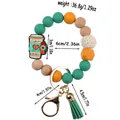 Silicone bead keychain bracelet with coffee cup charm and tassel dimension details - Green
