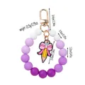 Silicone beaded keychain bracelet with purple gradient beads and cute pencil charm - Purple