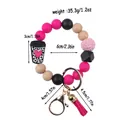 Pink and black silicone bead keychain bracelet with a coffee cup charm and pink tassel - Rose Red