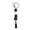 Black and white silicone bead keychain with octagonal bead and black tassel bag charm - Black