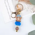 Cute highland cow keychain with bright blue pom-pom and silicone beads bag charm - Hat Style / Blue