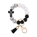 Silicone beaded keychain bracelet with Jesus cross charm and black PU tassel detail - Black