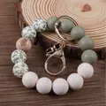 Silicone beaded wristlet keychain with olive green, white and leaf print beads - Olive Green
