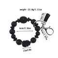 Black daisy silicone beaded bracelet keychain with tassel and clasp measurements - Black