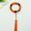 Handmade silicone bead wristlet keychain featuring orange PU tassel and leopard beads - Orange (K-1186)