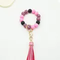 Pink and black silicone bead keychain bracelet with leopard print pattern and pink PU tassel - Rose Red (K-1186)