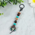 Μπρελόκ με χάντρες στυλ καουμπόη με κεφαλή ταύρου και μίνι καπέλο για τσάντα - Εθνικό Στυλ Καφέ Τυρκουάζ (2208-05)