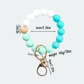 Handmade candy colored silicone beaded keychain with wooden bead and gold clasp bag charm - Mint Green