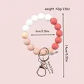 Candy-colored silicone bead keychain bracelet with dimensions and weight info - Red