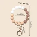 Earth tone silicone and wood bead keychain bracelet with detailed size and weight info - Coffee