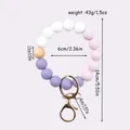 Candy color silicone bead wristlet keychain with wooden bead and gold lobster clasp - Purple