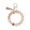 Nude pink silicone bead bracelet keychain featuring daisy flower charm and leather tassel - Light Coffee