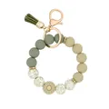 Sage green daisy silicone bead wristlet keychain variant with tassel and gold clasp - Green