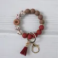 Boho silicone bead keychain bracelet with daisy sunflower charm and red leather tassel - Brown Red Tassel