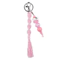 Handmade pink macrame keychain with cute silicone cow bead and tassel charm - Pink