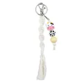 Handmade macrame cow keychain with pink silicone beads and a stylish tassel bag charm - White