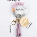 Silicone and wooden bead wristlet keychain with purple tassel and mama engraved tag - Light Purple