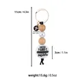 Religious beaded keychain with wooden beads and 'With God' quote, gold-toned ring - Black Cross / Black