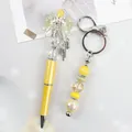 Yellow beaded pen and matching keychain set with glitter bow and rhinestones accessory - Yellow