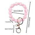 Rosa Silikon-Perlen-Schlüsselanhänger Armband mit LOVE-Buchstaben und Gold-Hardware - LOVE-Buchstaben-Stil / Hellrosa