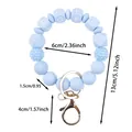 Hellblaues Silikonperlen-Schlüsselanhänger-Armband mit LOVE-Buchstaben und Maßen - LOVE-Buchstaben-Stil / Himmelblau