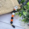 Μπρελόκ φάντασμα Halloween με χάντρες σιλικόνης και μαύρη φούντα - Φάντασμα Κολοκύθα (K-1415)