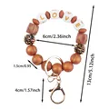 Silikon-Schlüsselanhänger mit LOVE-Perlen und Größenangaben in eleganter Roségold-Optik - LOVE-Buchstaben-Stil / Braun